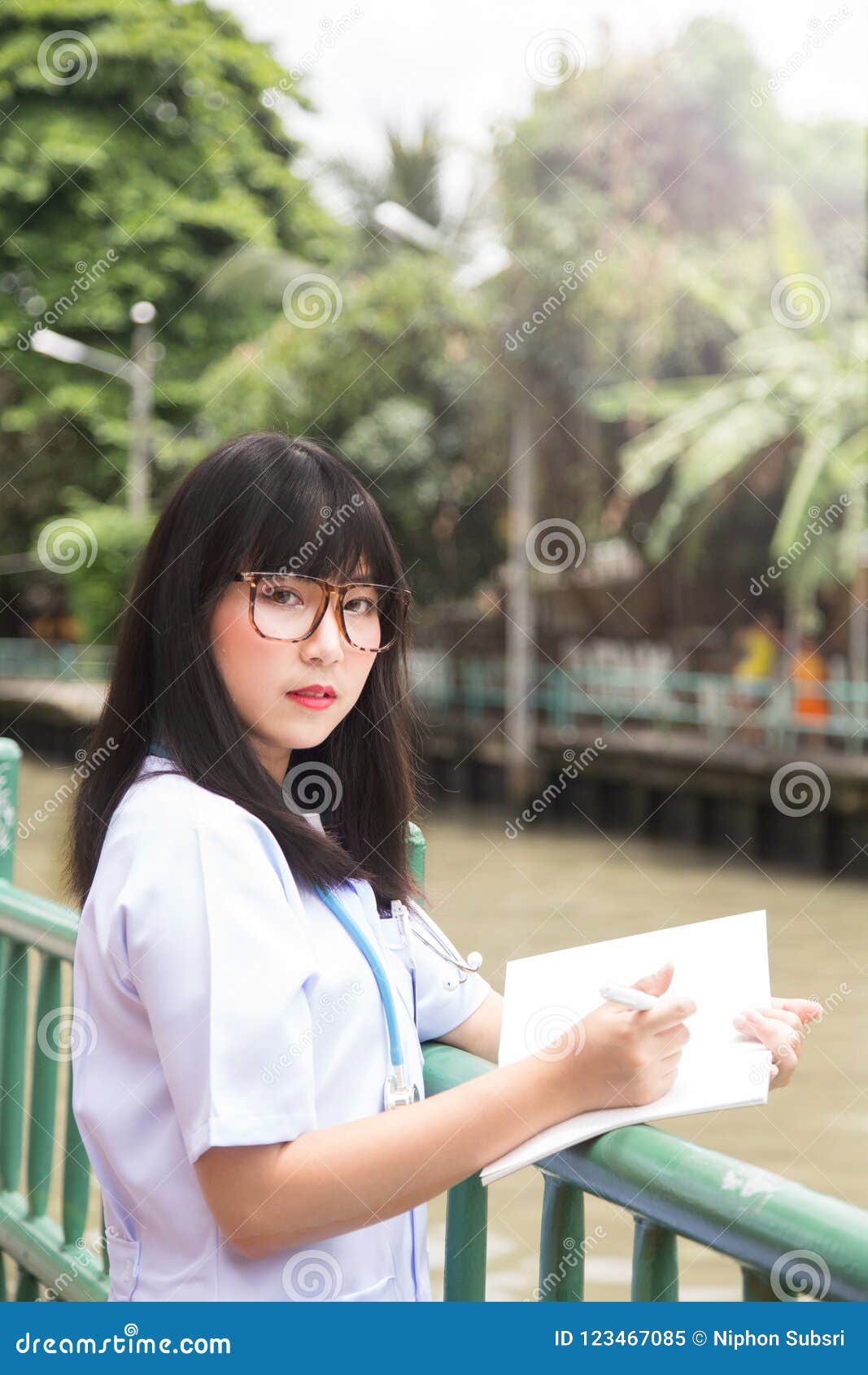 woman asian doctorÃÂ  white shirt suit with stethoscope outdoor h